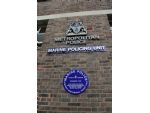 Sign on the historic Wapping police station building.
